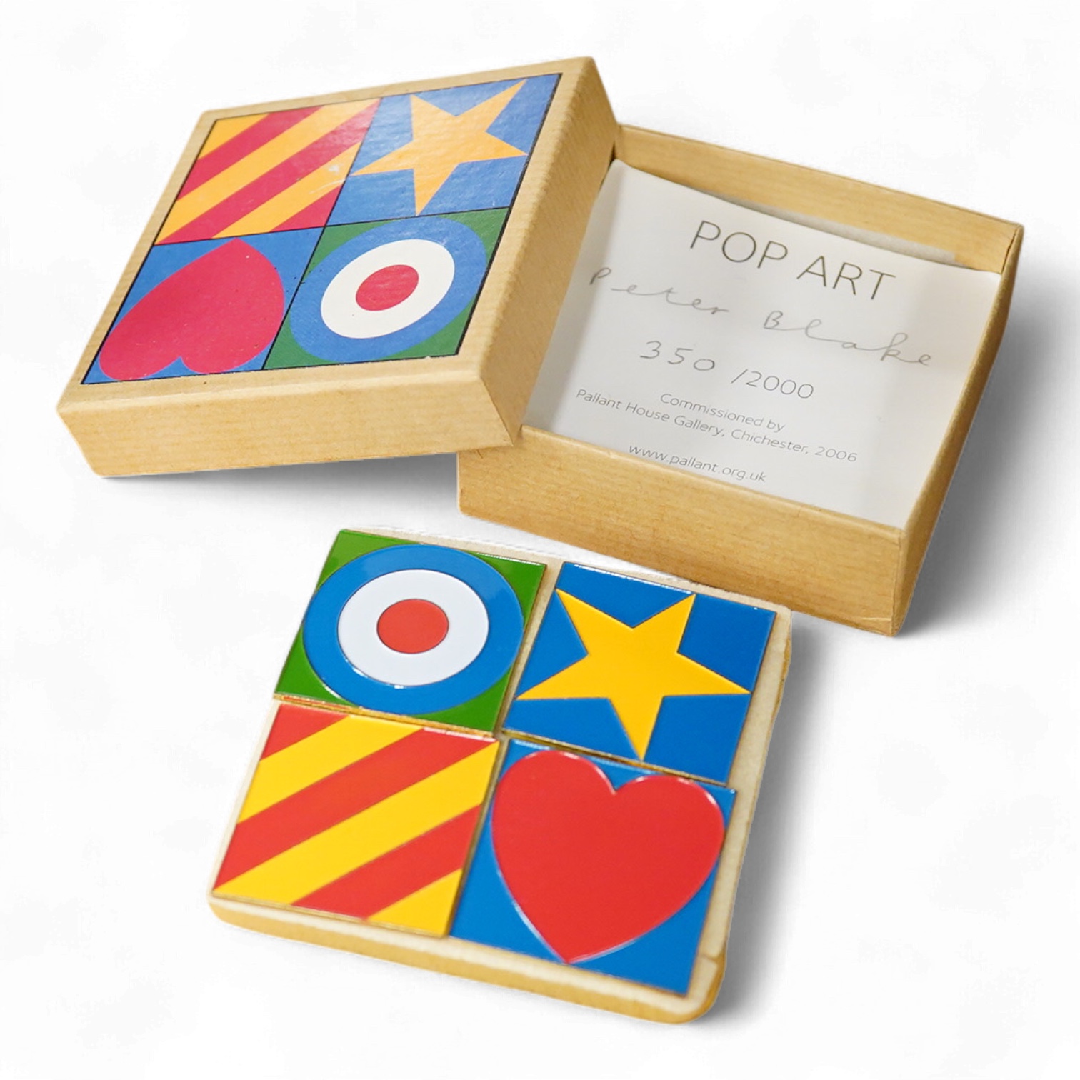 Peter Blake - a boxed set of four badges, in box with signed limited edition certificate, 2006